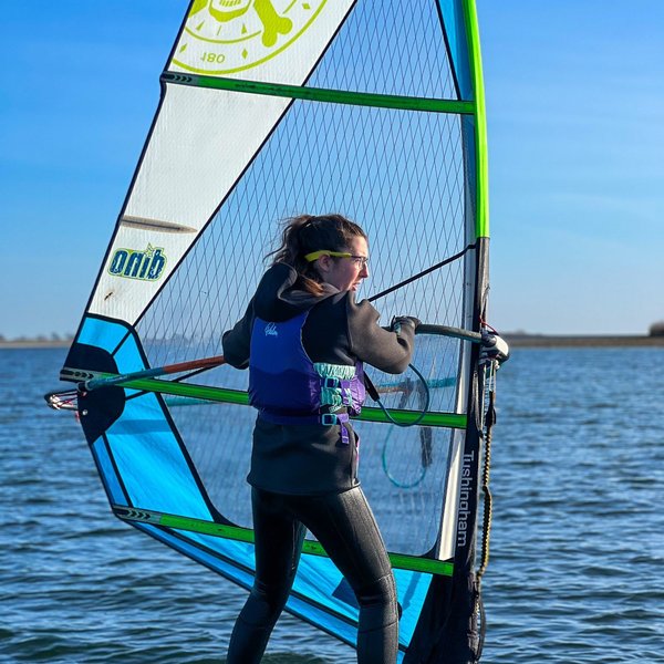girl windsurfing