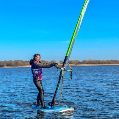 girl windsurfing