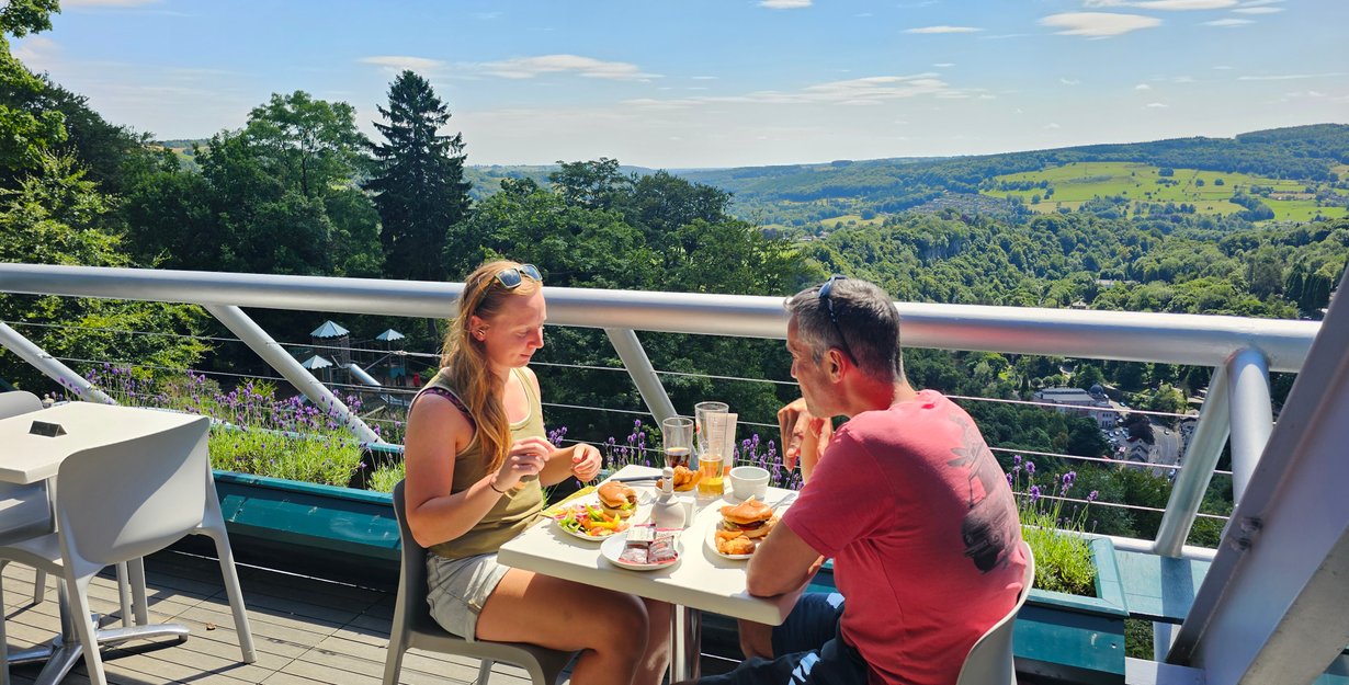 Couple eating at the Vista Restaurant with scenic views
