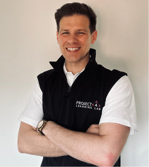 Headshot of Adam Jones-Bradburn