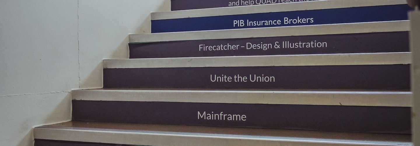 Photo of the staircase in QUAD where each step is sponsored by a different compamy