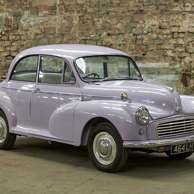 A light purple vintage car