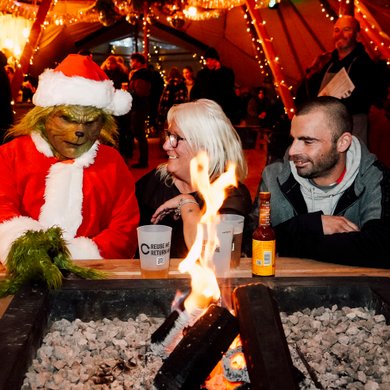 Grinch and Friends Enjoying Drinks by the Nordic Bar Firepit