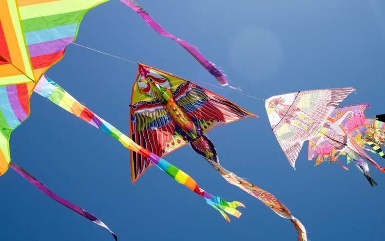 Colourful kites in sky