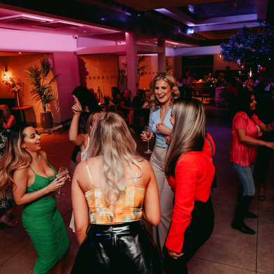 Ladies dancing at Nicco's Restaurant