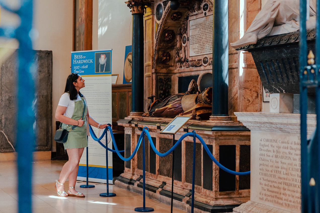 Lady viewing Bess of Hardwick tomb at Derby Cathedral