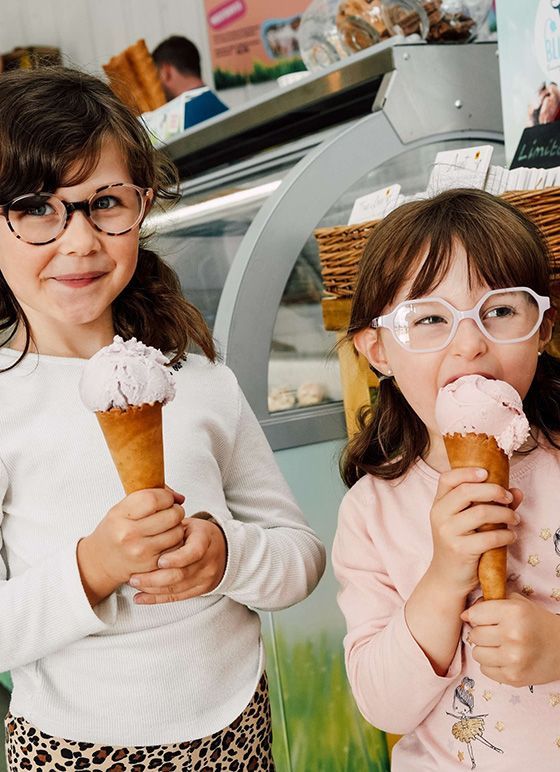 Two young girls enjoying Bluebell's ice cream