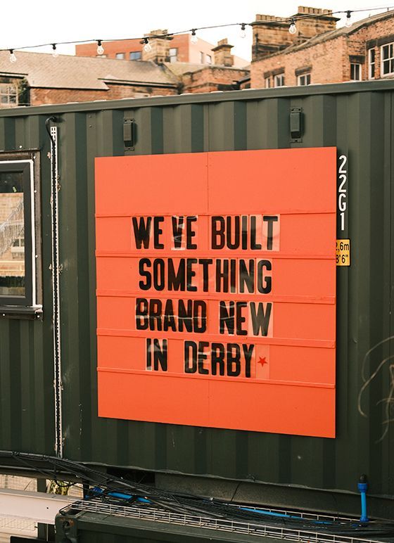 A sign at Bustler reading We've built somethign new for Derby