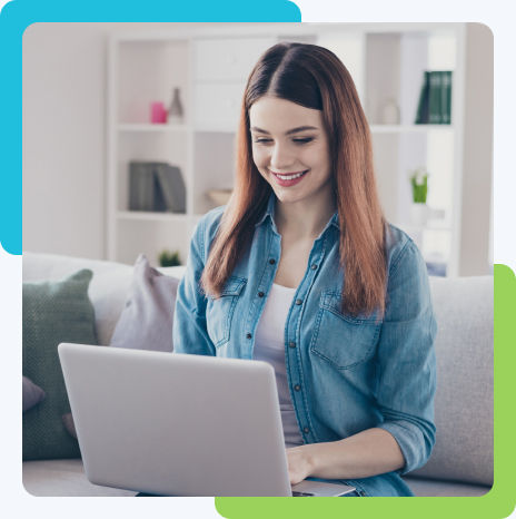 A girl is browsing on her laptop