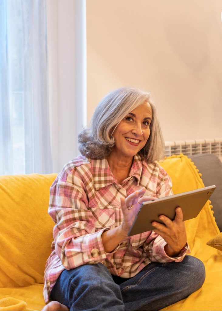 Senior relaxing at home with cable TV and internet on one bill
