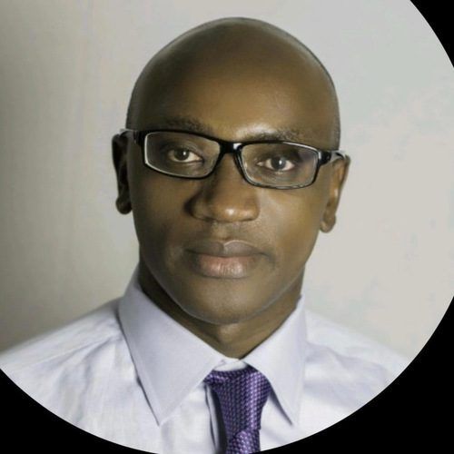 Portrait of Dr. Erick K'omolo, Board Chairman at Tree Niches