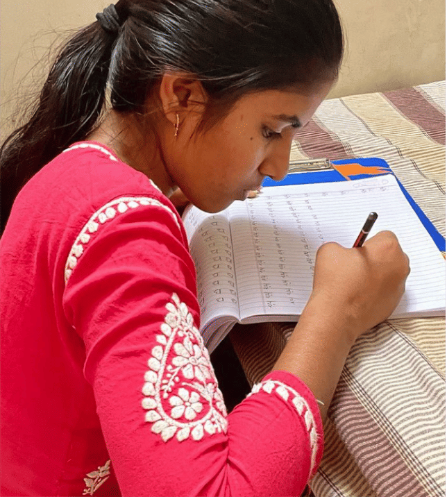 Sonam never went to school, and is now learning how to read and write.