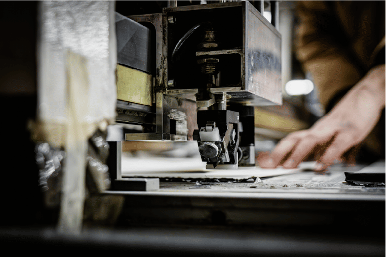 Cutting tool processing flat sheet material
