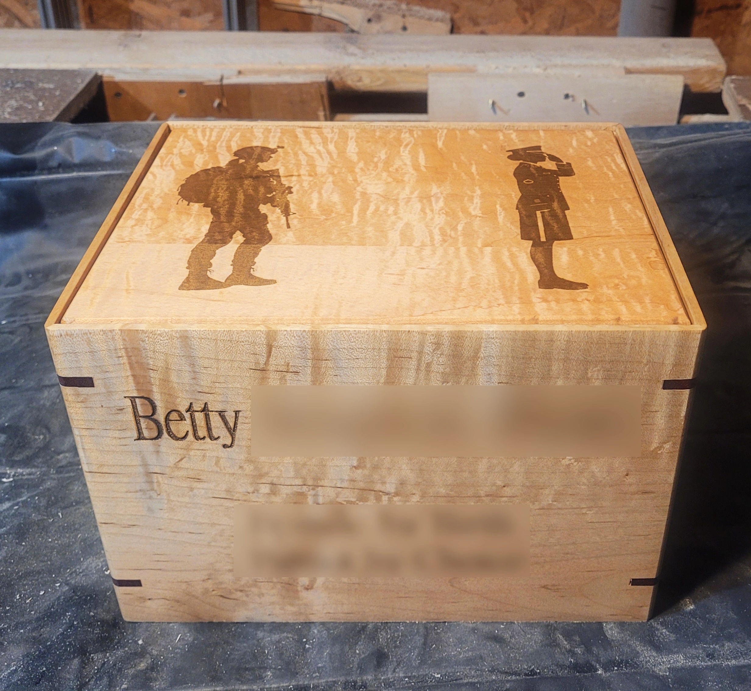 handcrafted curly maple cremation urn with custom laser engraved military tribute