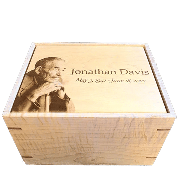 solid maple wood beautifully handcrafted urn engraved with an individuals portrait