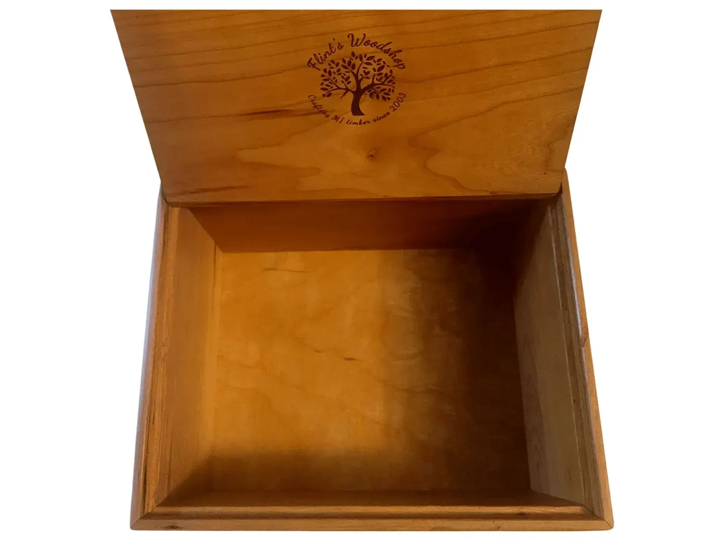 A finished handcrafted hardwood urn