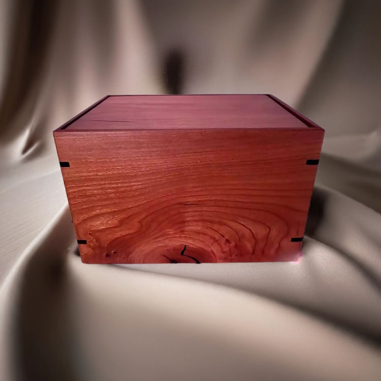 Front and top view of Artisan's Cherry Memorial Urn, showcasing its design and customizable engraving area