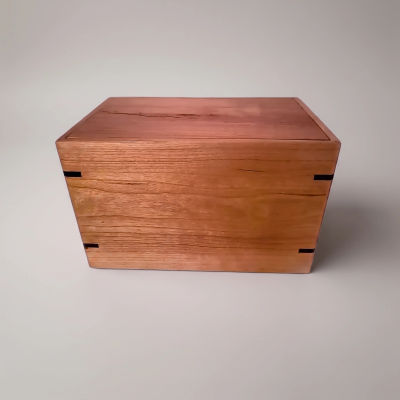 Front and top view of  Biodegradable Cherry Urn , showcasing its design and customizable engraving area