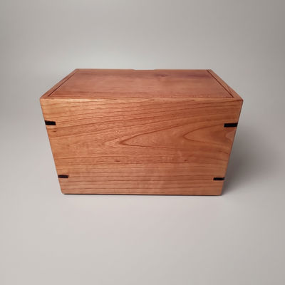 Front and top view of  Cherry Urn for Ashes , showcasing its design and customizable engraving area