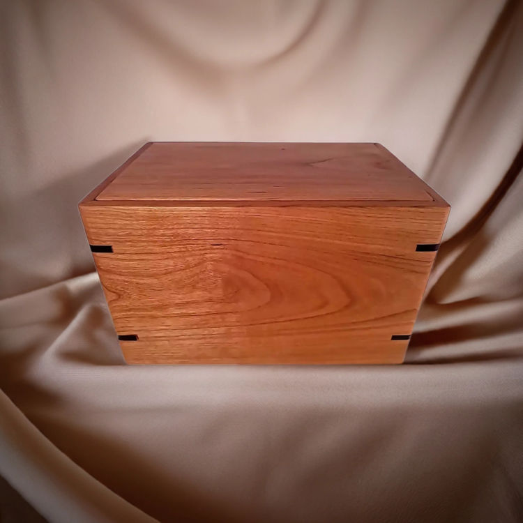 Front and top view of  Cherry Warm Remembrance Urn , showcasing its design and customizable engraving area
