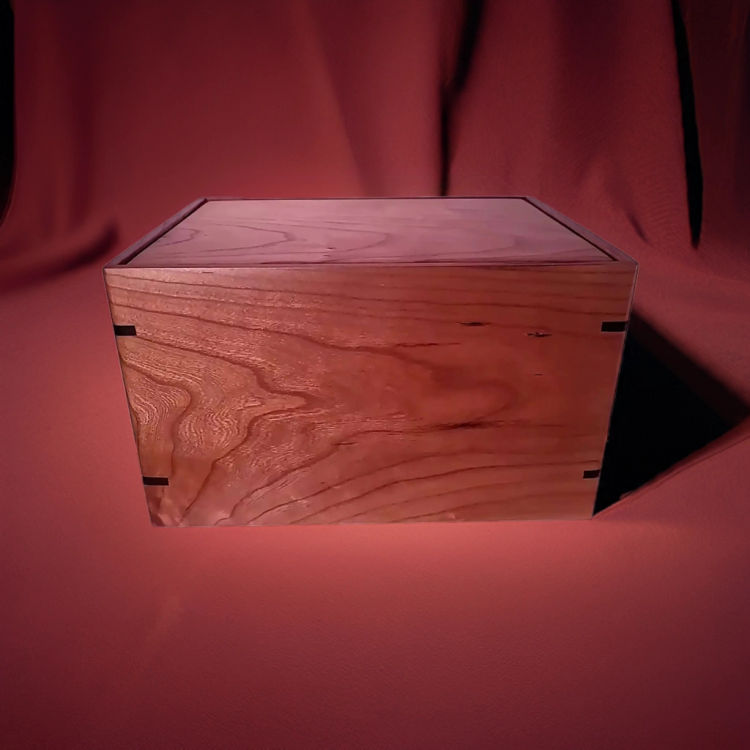 Front and top view of  Cherry Wood Legacy Urn , showcasing its design and customizable engraving area