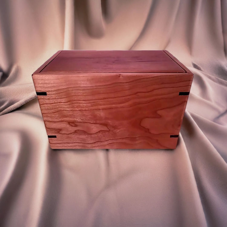 Front and top view of  Handcrafted Cherry Urn , showcasing its design and customizable engraving area