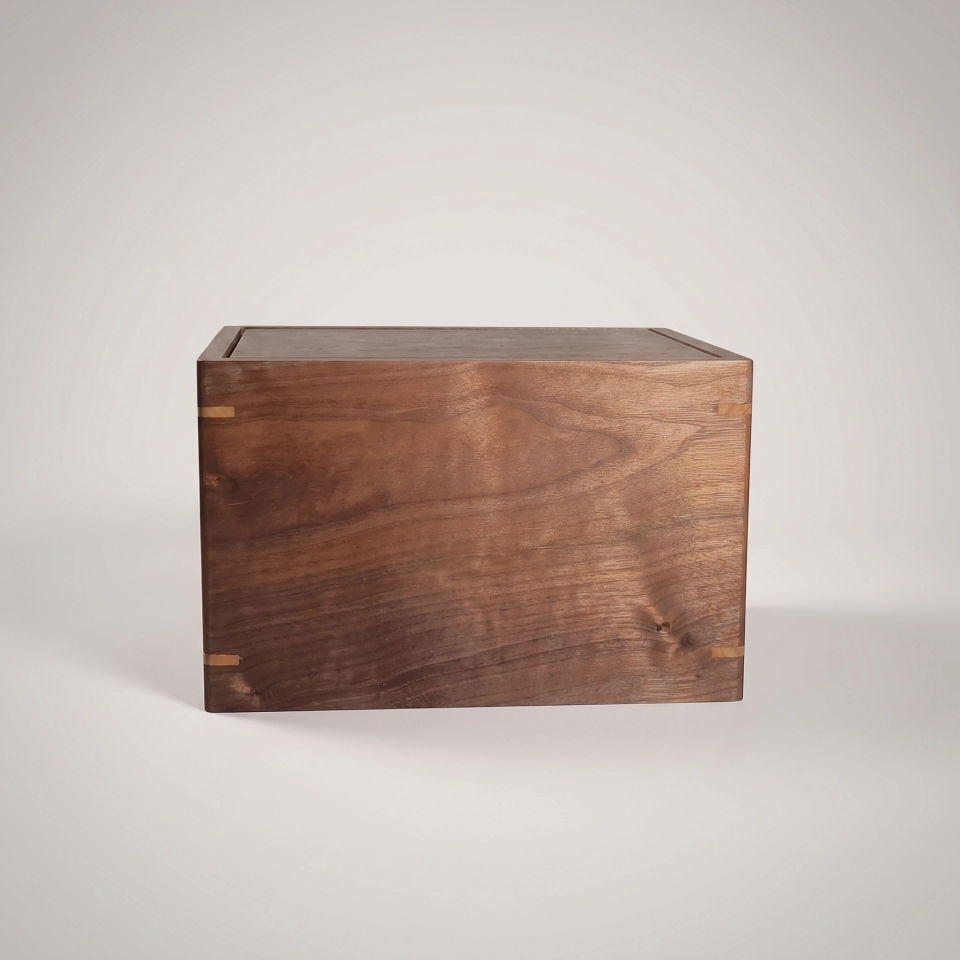 One-of-a-kind walnut cremation urn, handcrafted and laser engraved in Michigan