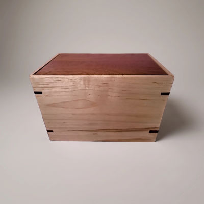 Front and top view of Mahogany and Maple Elegance Urn, showcasing its design and customizable engraving area