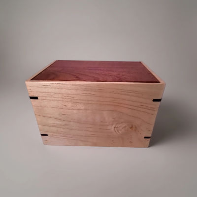 Front and top view of Mahogany and Maple Remembrance Urn, showcasing its design and customizable engraving area