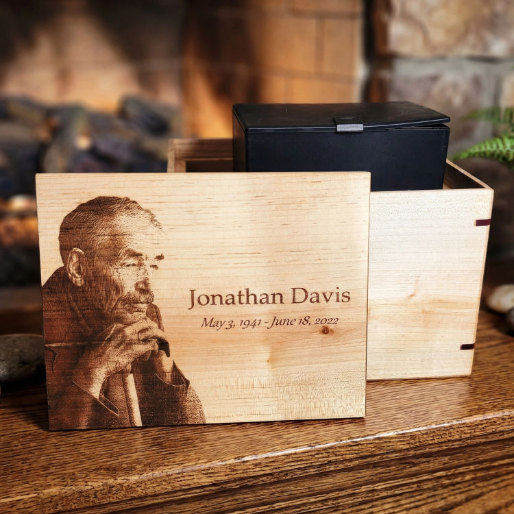 Companion hardwood cremation urn with lid removed, displaying space for a standard cremation container (shown but not included).