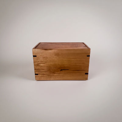 Front and top view of  Natural Cherry Engravable Urn , showcasing its design and customizable engraving area