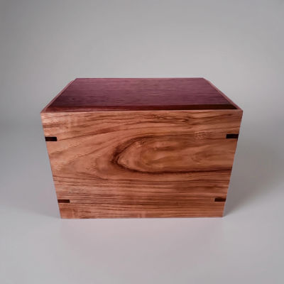 Front and top view of  Red-Hardwood Hickory Tribute Urn, showcasing its design and customizable engraving area