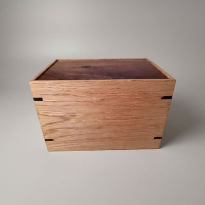 Front and top view of  Rustic Walnut and Hickory Urn , showcasing its design and customizable engraving area