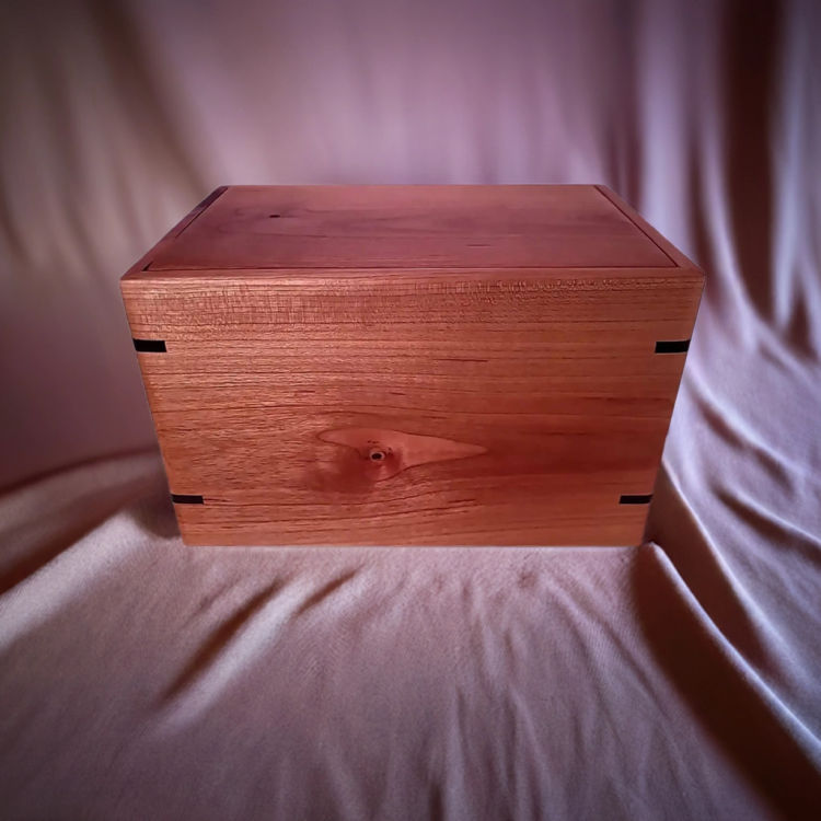 Front and top view of  Solid Cherry Keepsake Urn , showcasing its design and customizable engraving area