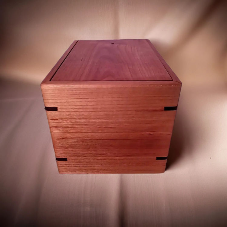 Side view of  Solid Cherry Keepsake Urn  with an elegant, earth-friendly natural-oil finish