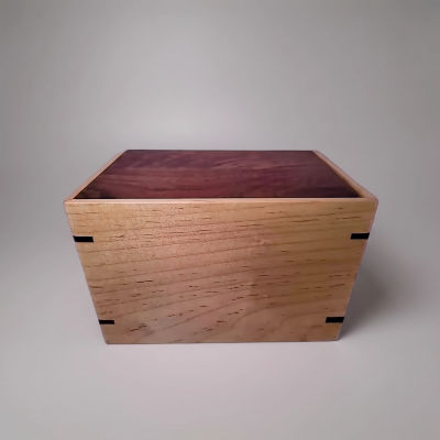Front and top view of Walnut and Maple Keepsake Urn, showcasing its design and customizable engraving area