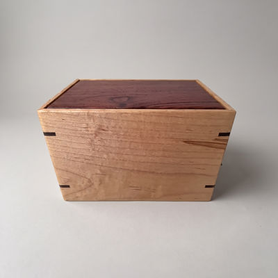 Front and top view of Walnut and Maple Lasting Memory Urn, showcasing its design and customizable engraving area
