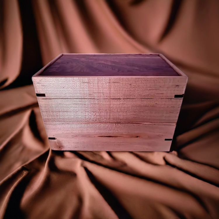 Front and top view of  Walnut and Maple Timeless Urn , showcasing its design and customizable engraving area