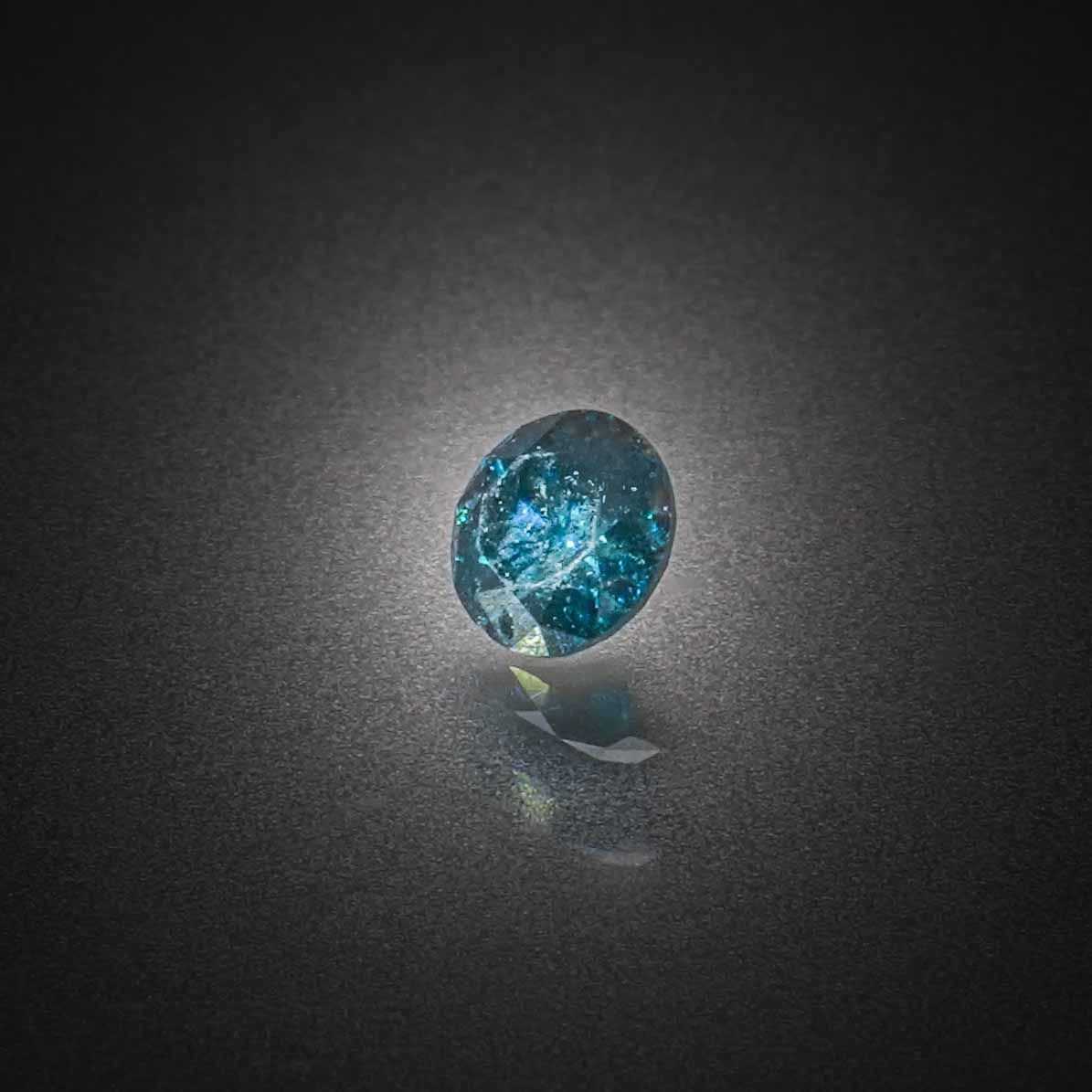 Diamant bleu rond sur papier. - Lazuli