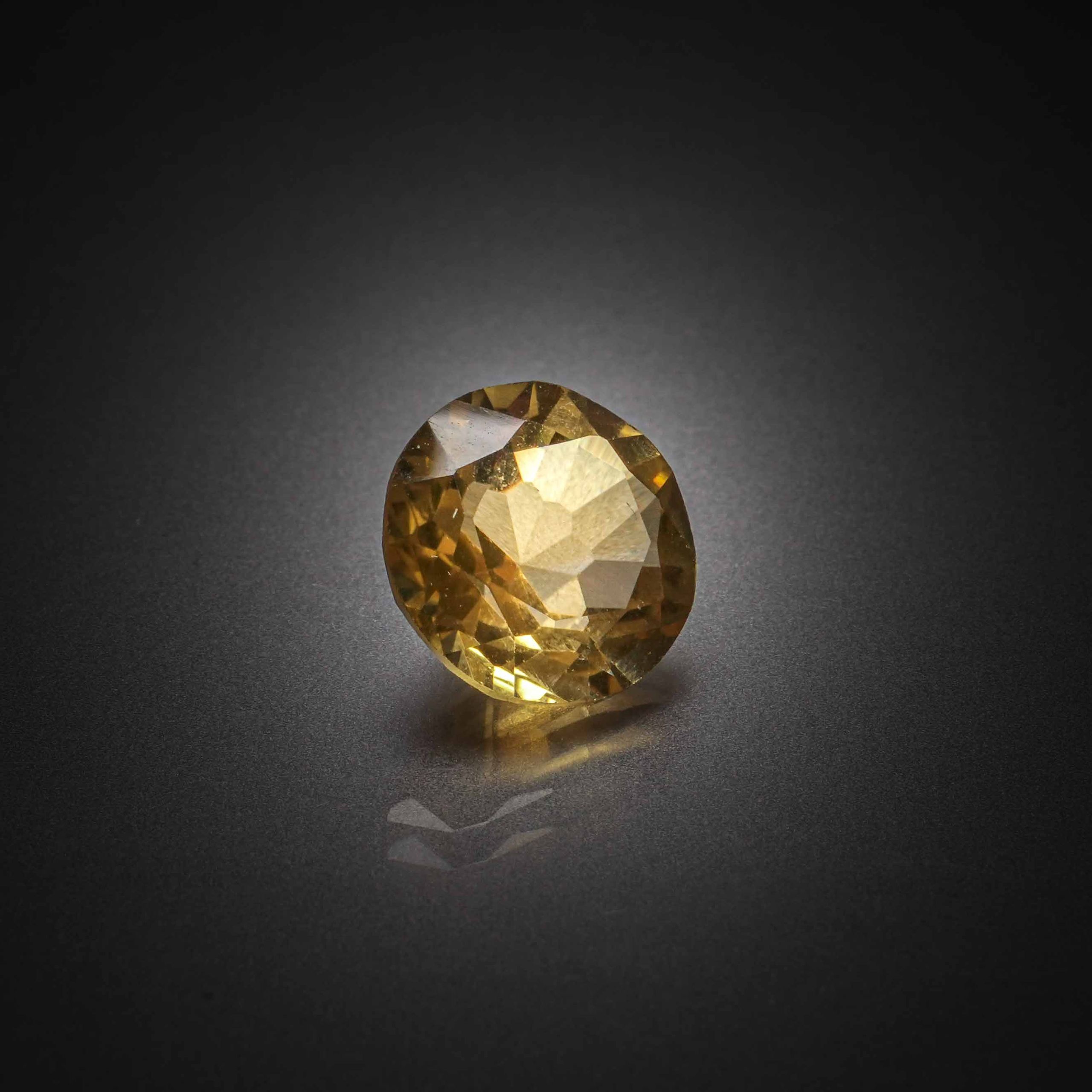 Citrine ronde sur papier. - Lazuli
