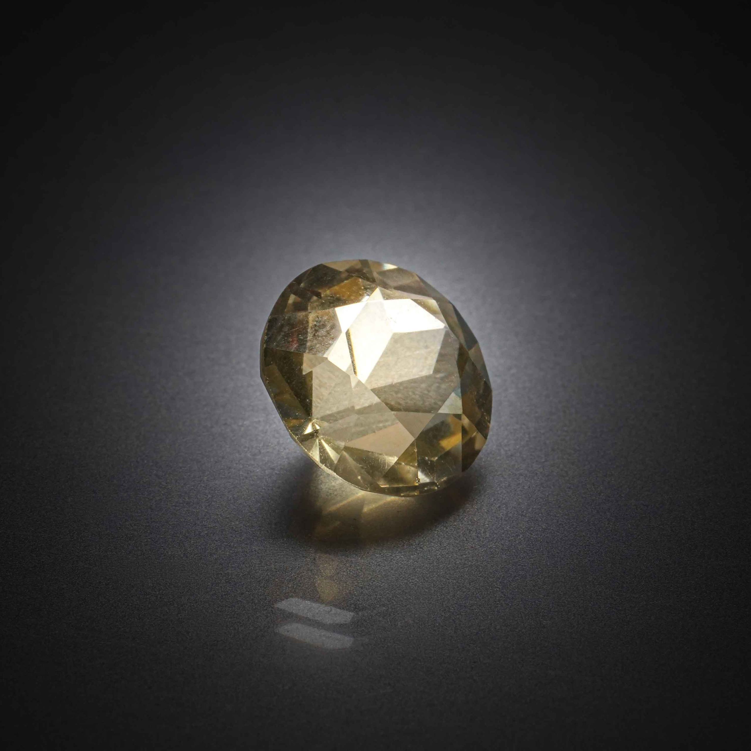 Citrine ronde sur papier. - Lazuli