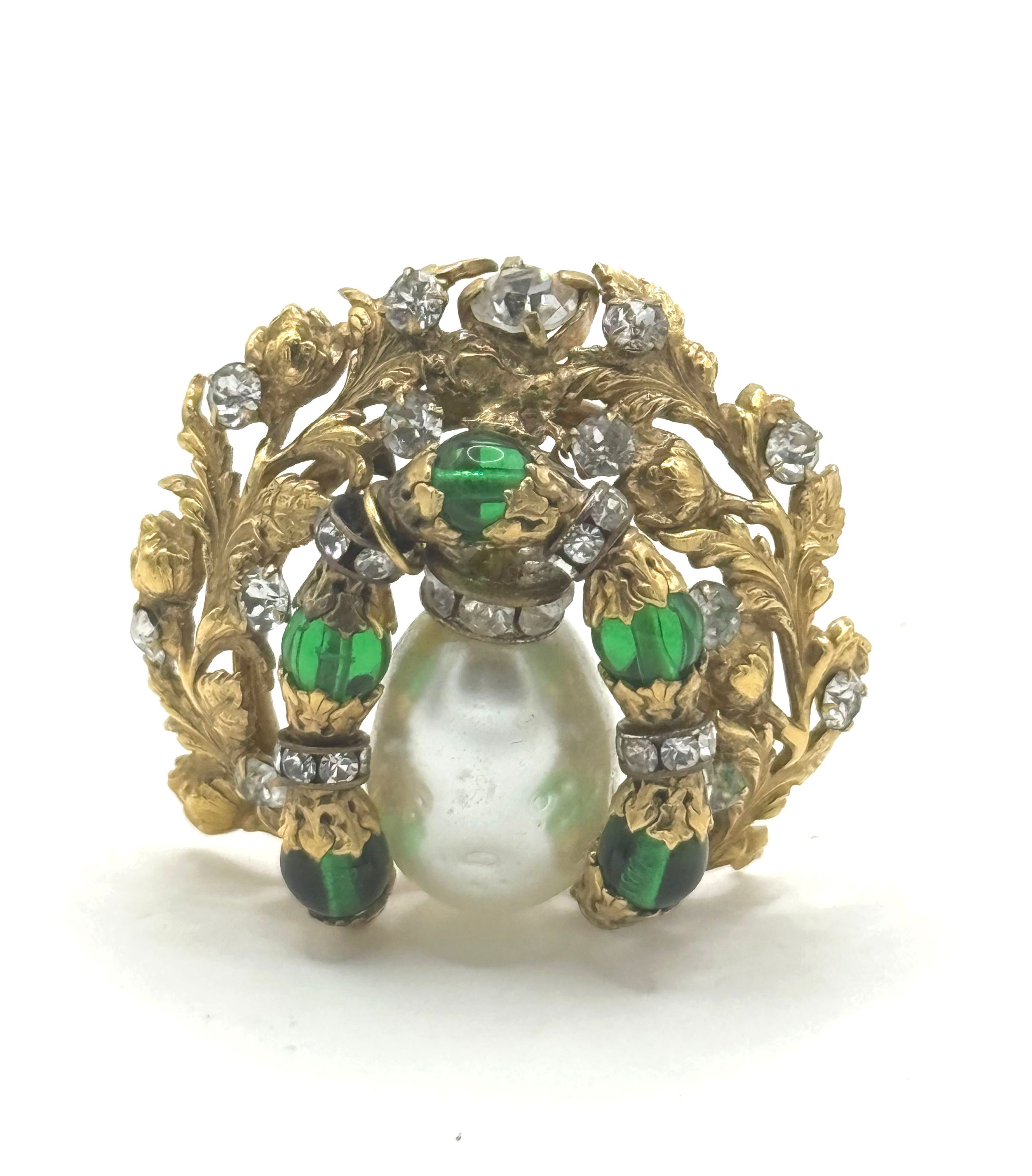 Broche en or jaune (750 millièmes) et argent ornée de diamants taille ancienne à décor floral et feuillagé. - Lazuli