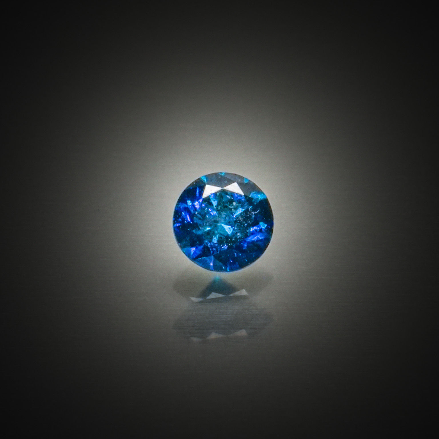 Lot de dix saphirs ronds sur papier. - Lazuli