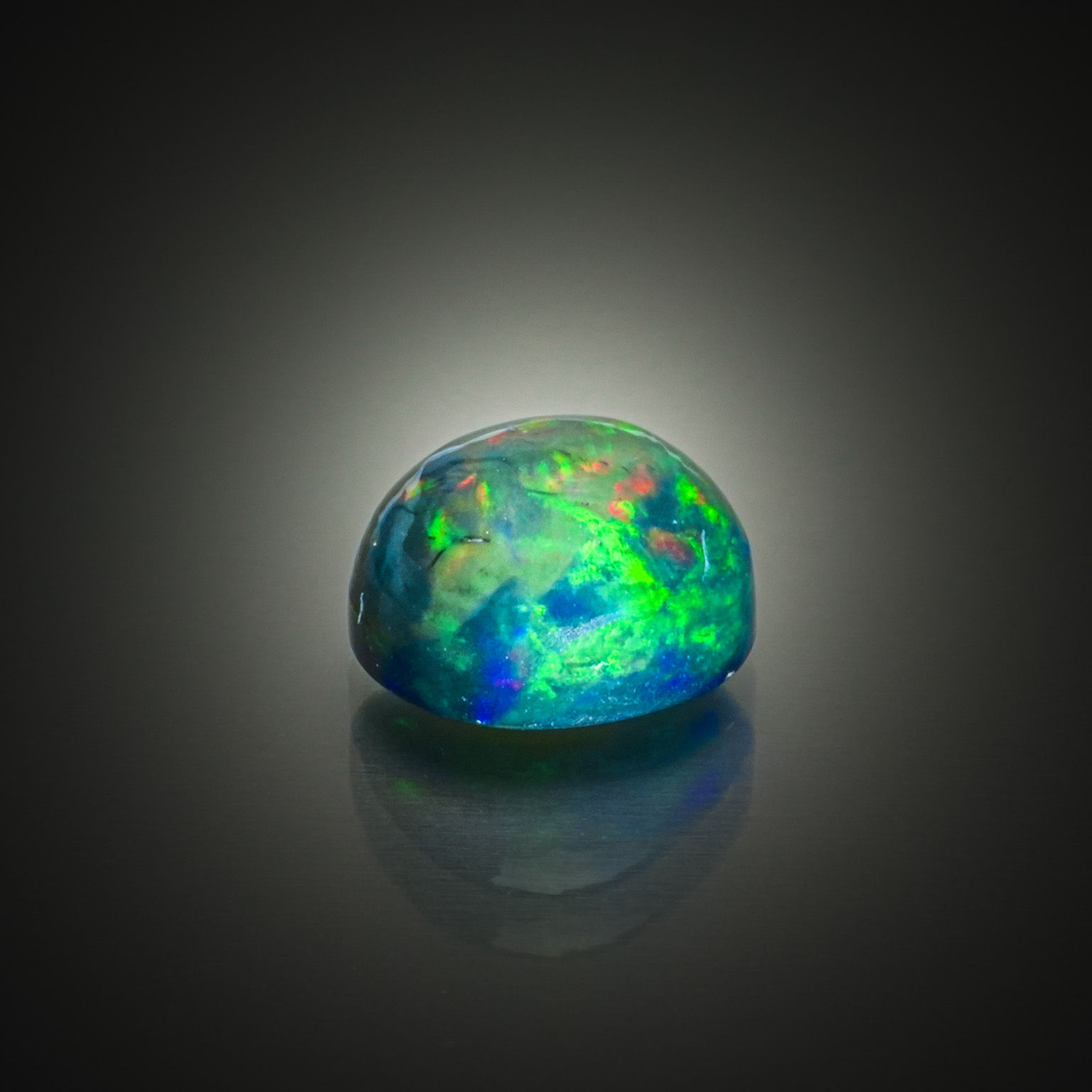 Lot de quatre saphirs trillions sur papier. - Lazuli