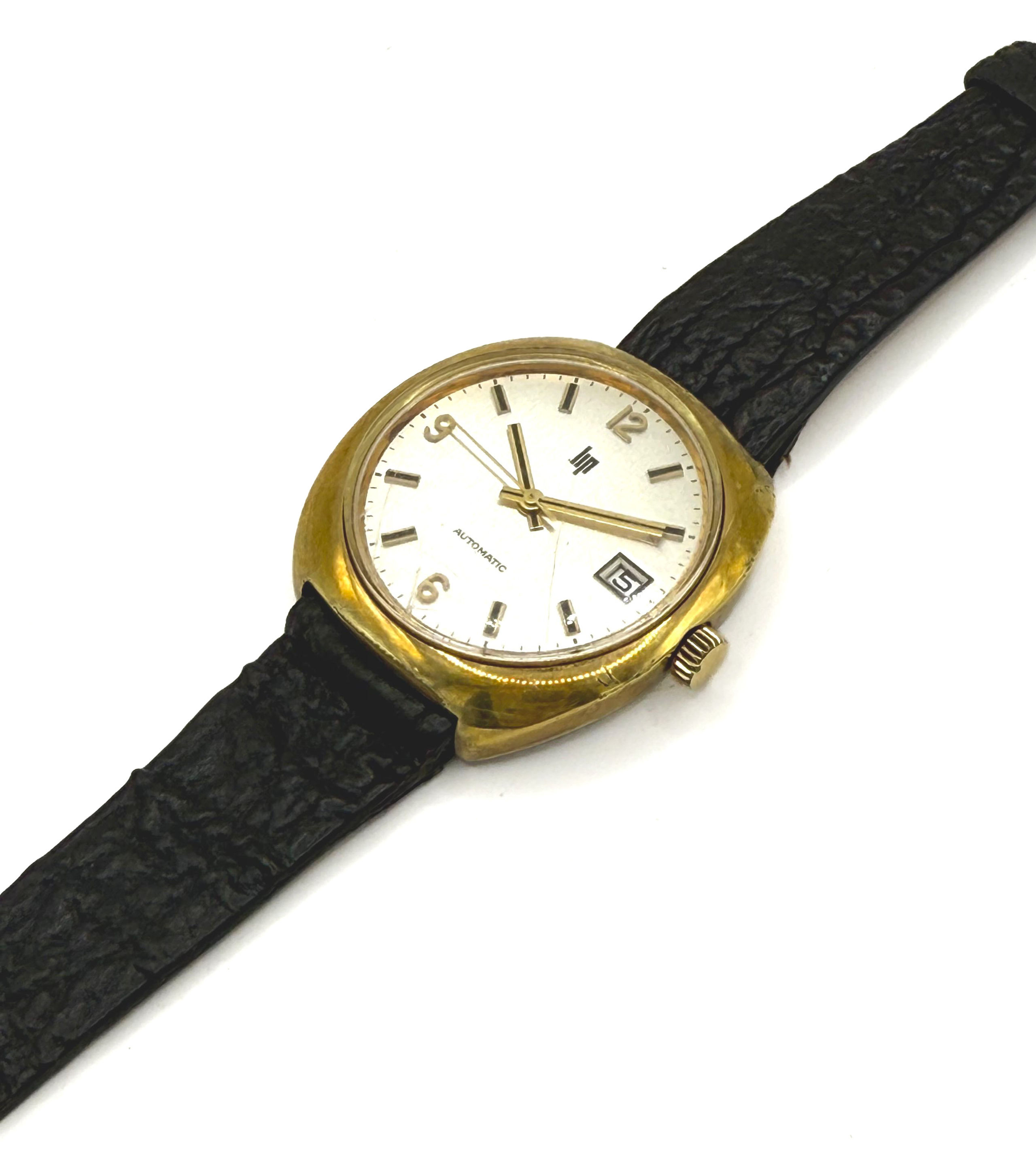 Bague en or rose (375 millièmes) ornée d&rsquo;une tourmaline dans un enroulements de deux lignes de diamants épaulée de deux tourmalines. - Lazuli