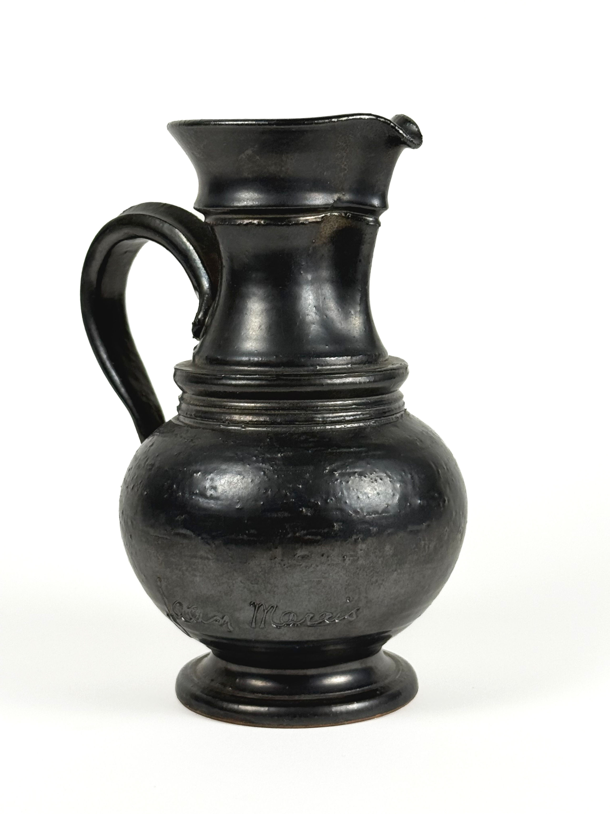 Bague en or rose (375 millièmes) ornée d&rsquo;un rubis pesant environ 2,15 ct épaulé de trois grenats et deux lignes de diamants. Accompagnée d&rsquo;un certificat IGTL. - Lazuli