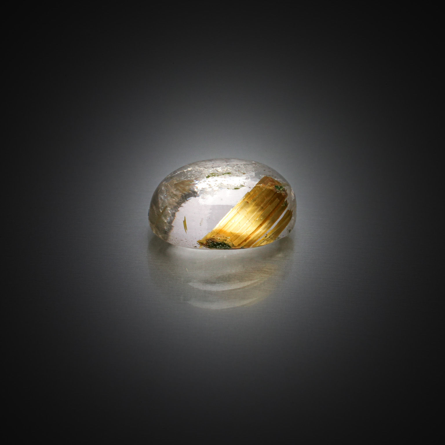 Quartz ovale cabochon sur papier. - Lazuli