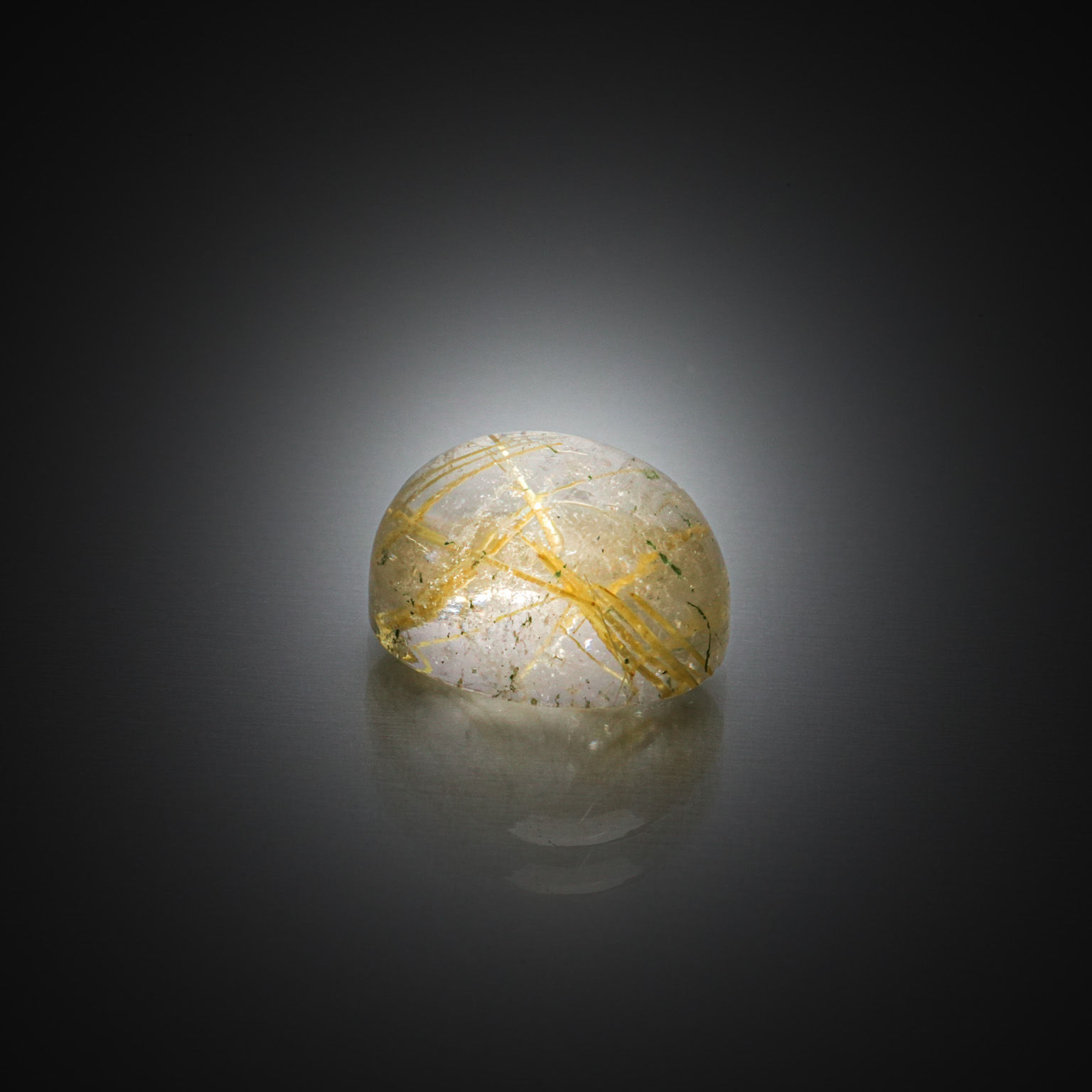 Quartz ovale cabochon sur papier. - Lazuli