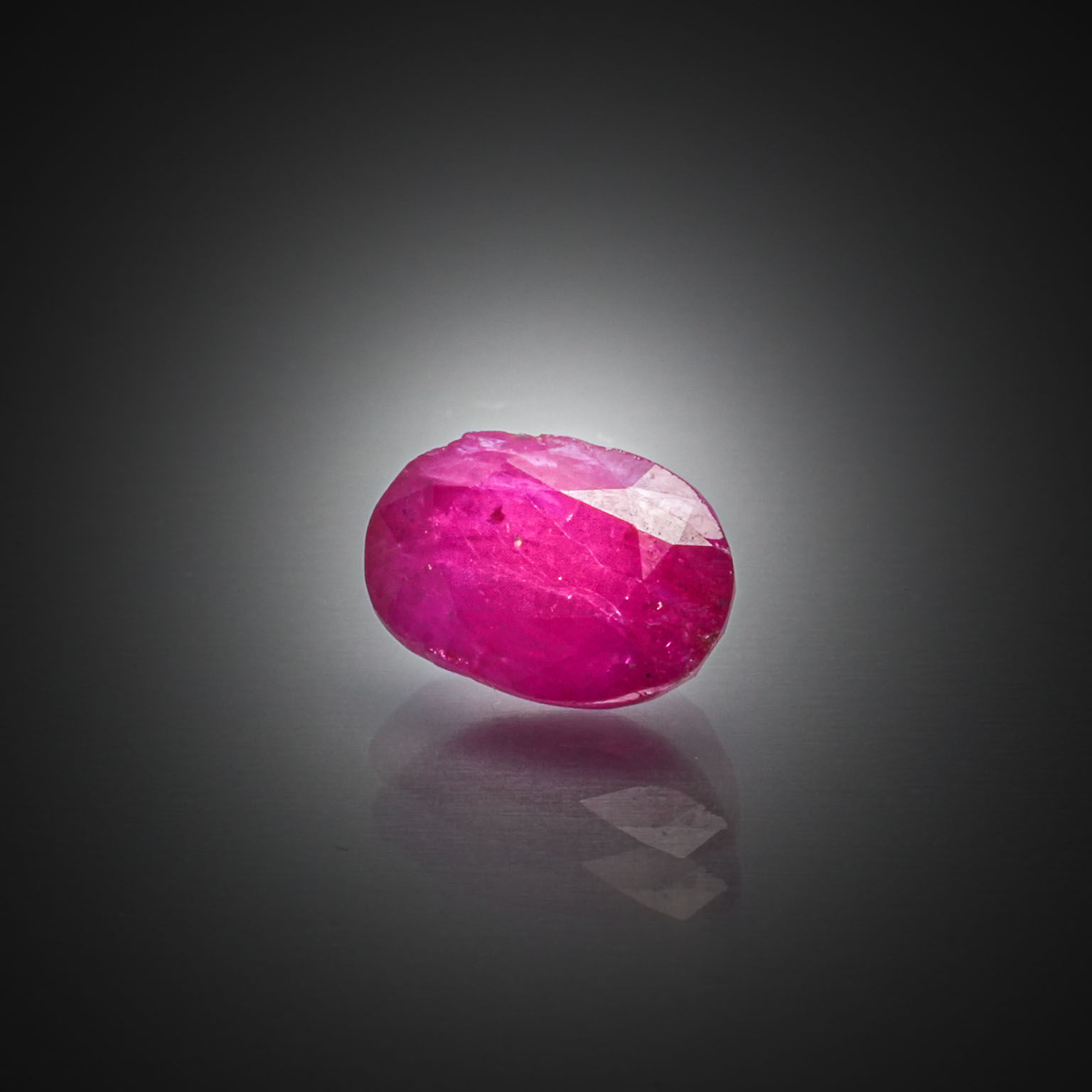 Quartz œil de tigre ovale cabochon sur papier. - Lazuli