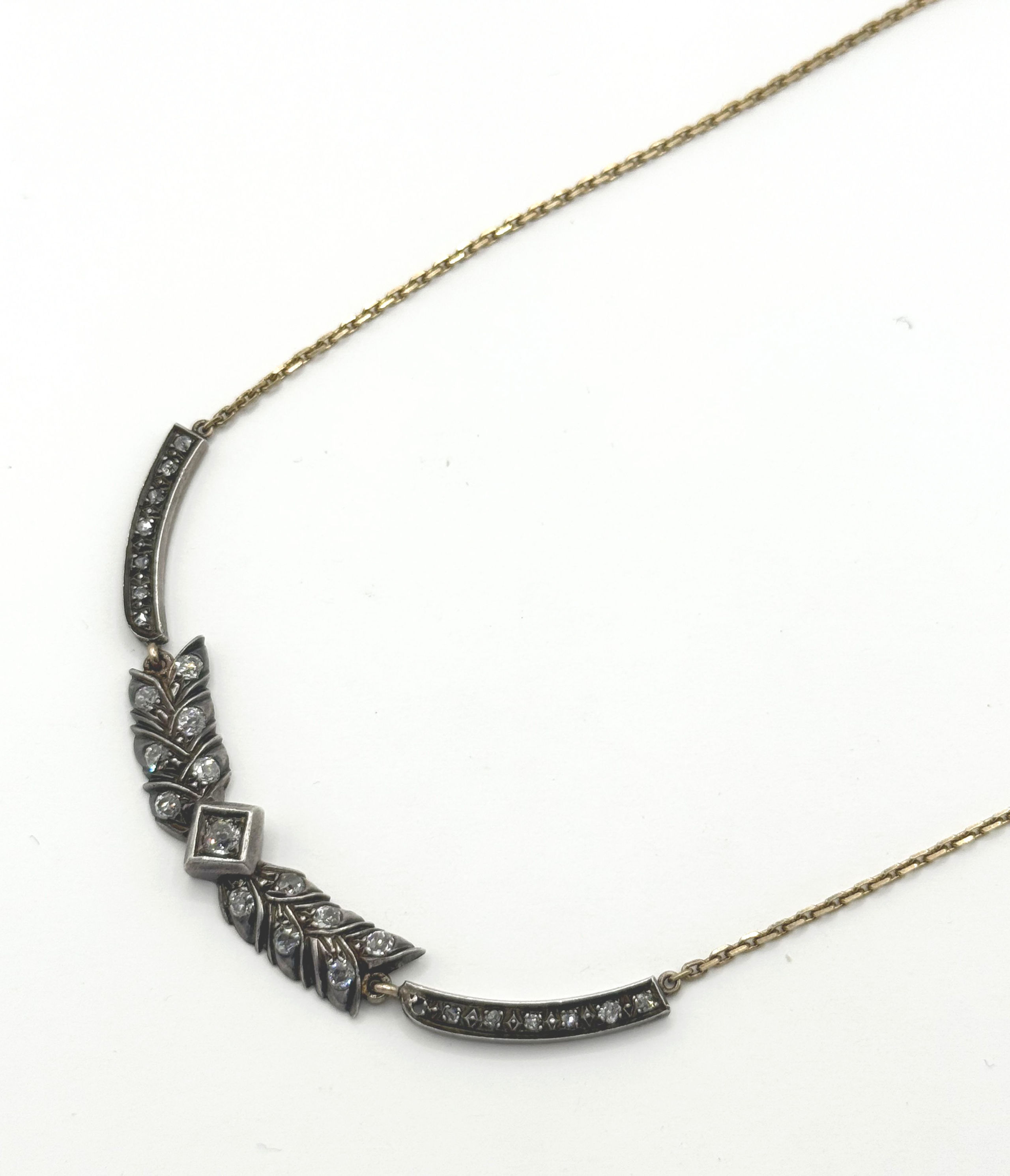 Collier en or jaune (750 millièmes) et argent à maille forçat orné de diamants taille ancienne. - Lazuli